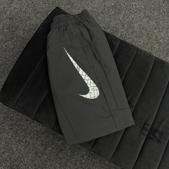 NIKE REFLECTIVE TRACK PANTS