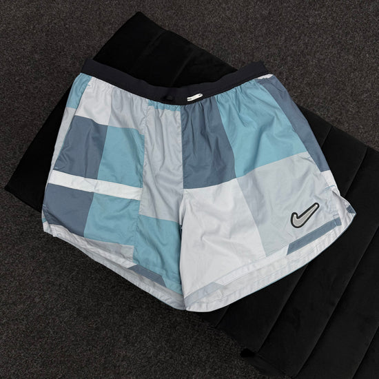 NIKE BLUE PATCHWORK SHORTS