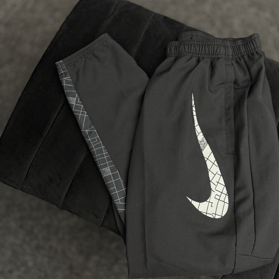 NIKE REFLECTIVE TRACK PANTS